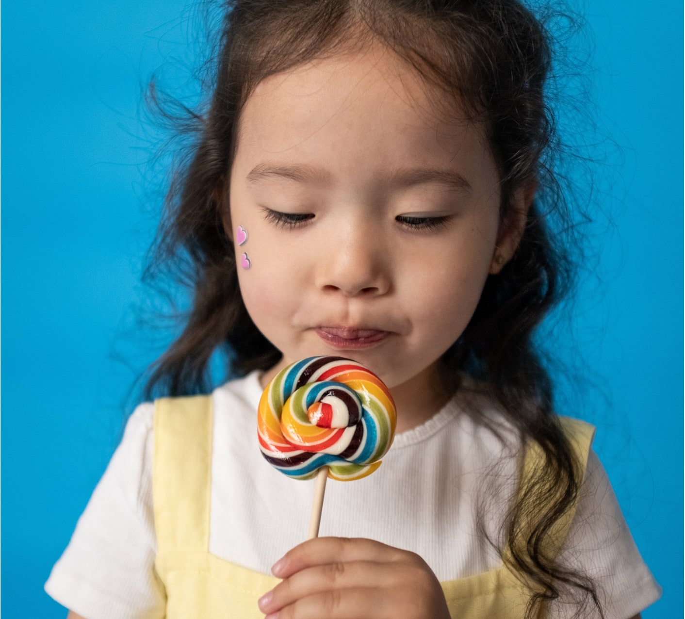 Little girl with lolipop